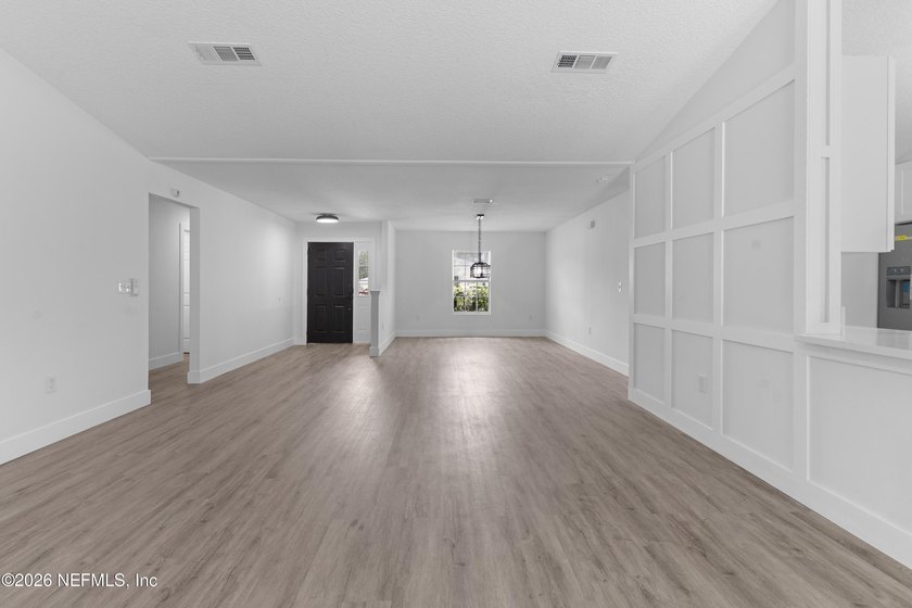 Welcome home to this beautifully renovated 4-bedroom, 2-bath - photo 11