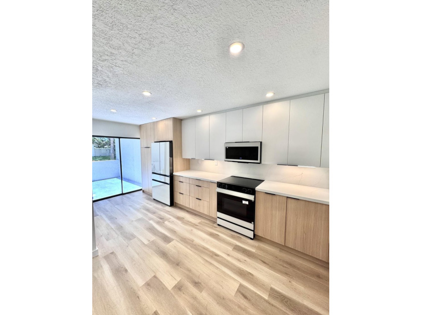 Move-in ready! Beautifully updated 2-bedroom, 2-bathroom CBS - photo 4