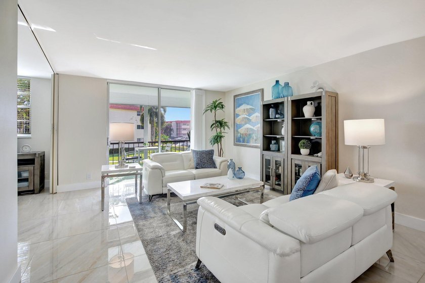 Beautiful Fully Upgraded Full Two Bedroom Condo In Popular Phase - photo 2