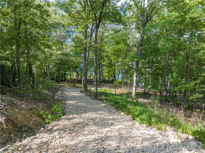 !.6 acres on beautiful Lake of the Ozarks. Gentle sloping lot - photo 18