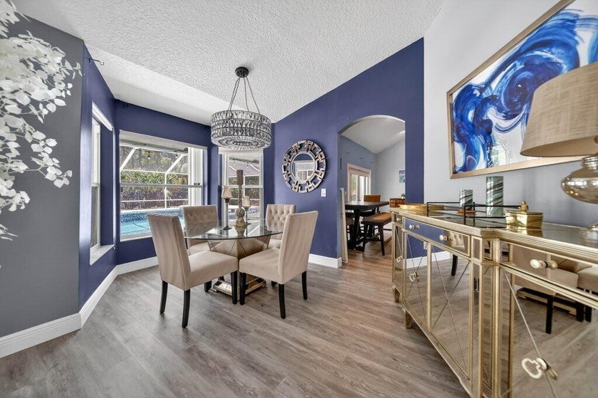 Welcome to this well-appointed 4-bedroom, 3-bathroom residence - photo 6