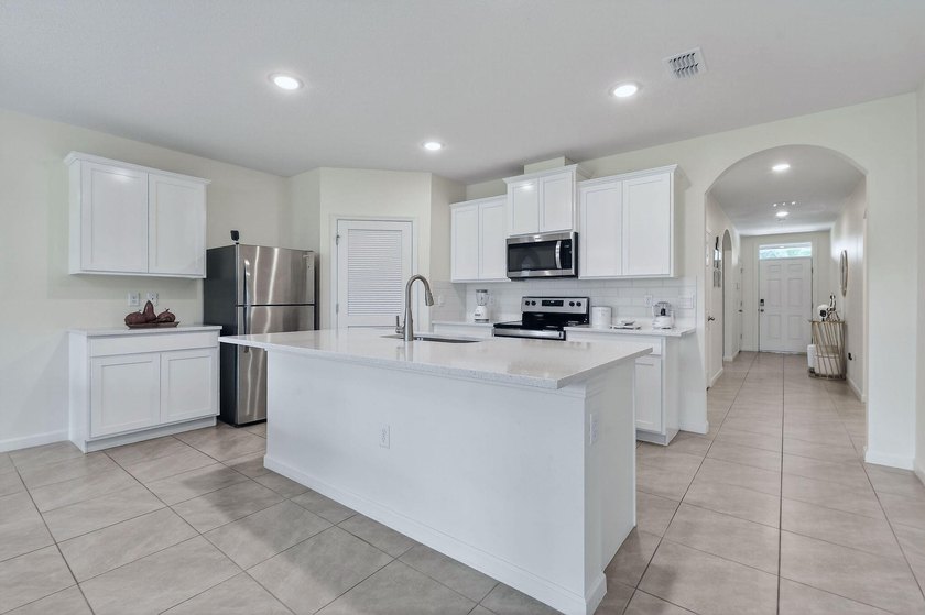 Built in 2023, this meticulously maintained 4/2 CBS home offers - photo 5