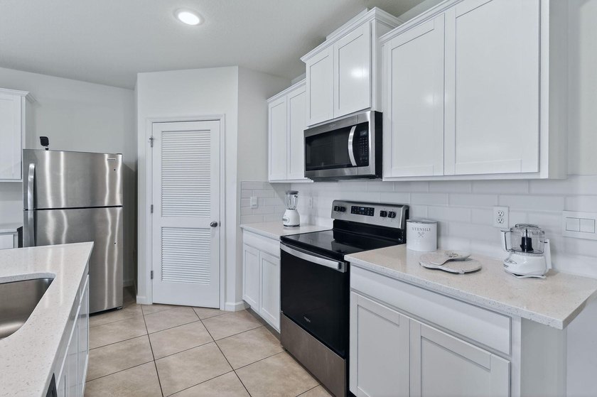 Built in 2023, this meticulously maintained 4/2 CBS home offers - photo 7