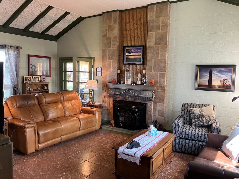 Life Changing Atmosphere! Located on the Rock River is this - photo 6