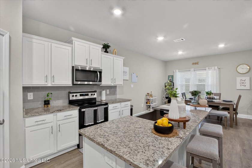 Some homes you tour. This one you settle into. The open layout - photo 12