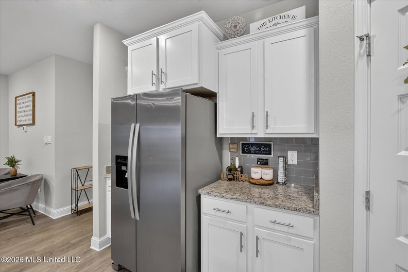 Some homes you tour. This one you settle into. The open layout - photo 16