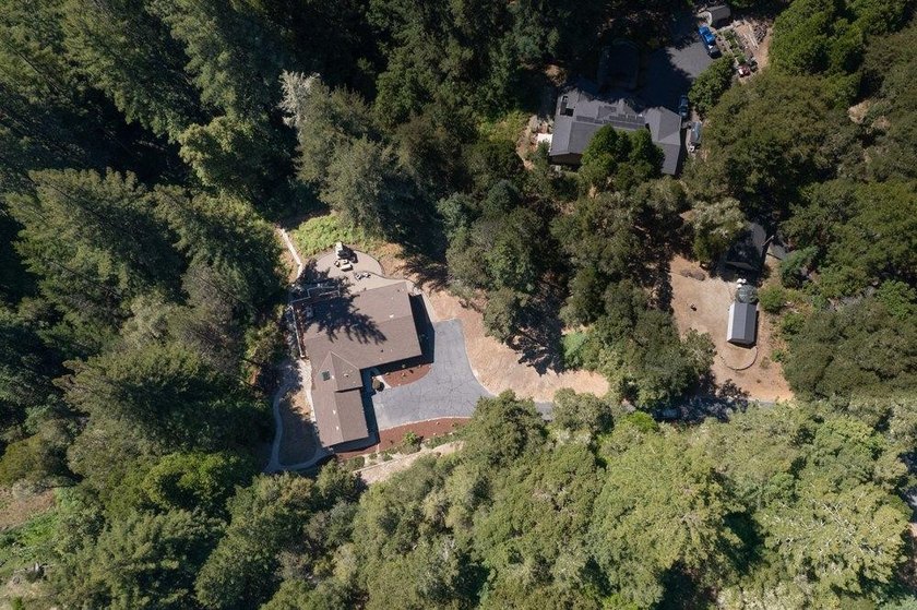 Nicely tucked back on approximately 2.8 peaceful acres in the - photo 24