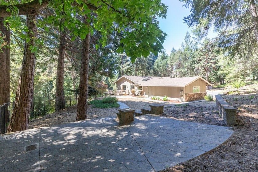 Nicely tucked back on approximately 2.8 peaceful acres in the - photo 34