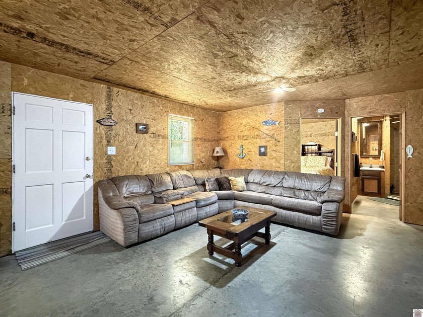 SECLUDED! Tucked away on 1.75 wooded acres, this cute 3-bedroom - photo 5