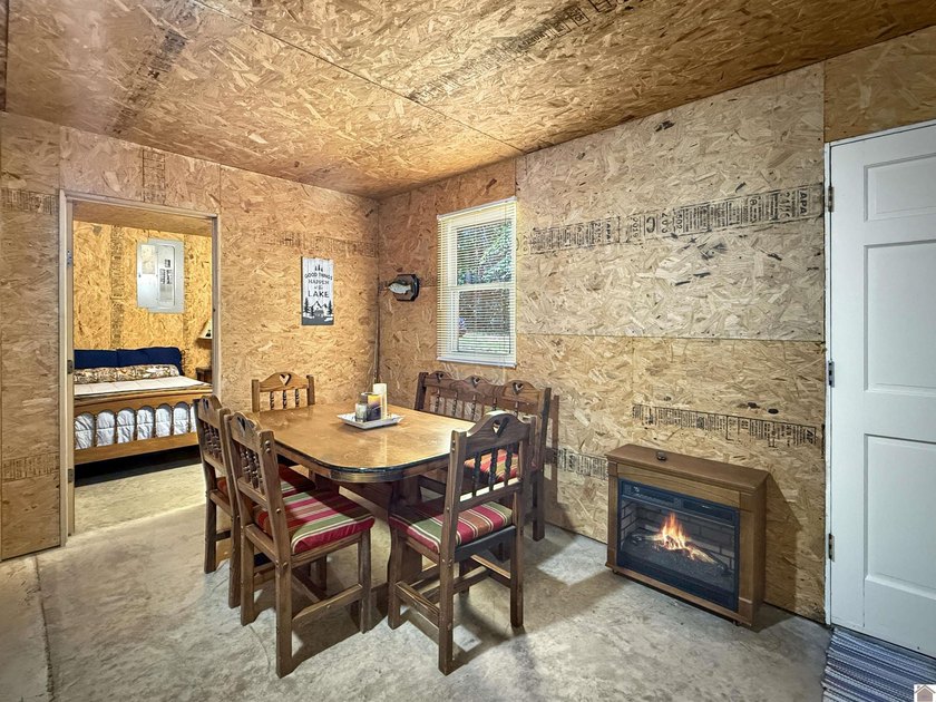 SECLUDED! Tucked away on 1.75 wooded acres, this cute 3-bedroom - photo 6
