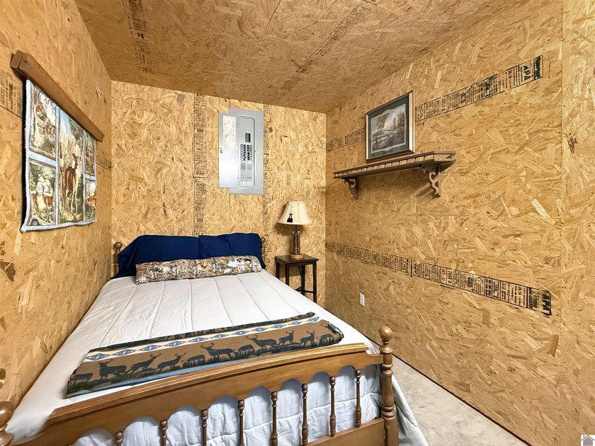 SECLUDED! Tucked away on 1.75 wooded acres, this cute 3-bedroom - photo 10