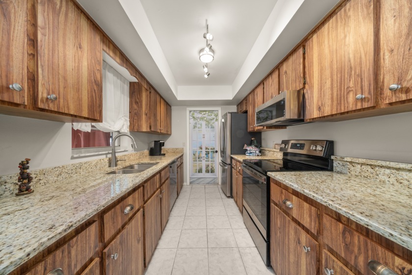 Wonderful galley style kitchen with granite countertops - photo 3