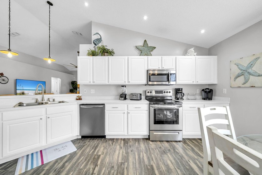 This well-appointed four-bedroom, two-bath home offers 1,919 - photo 17