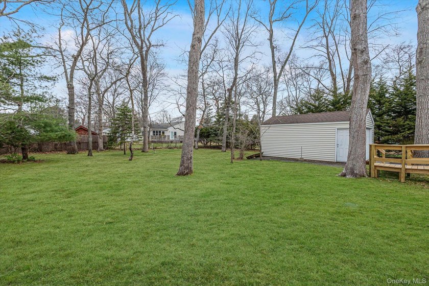 Experience the quintessential Bellport lifestyle in this - photo 17