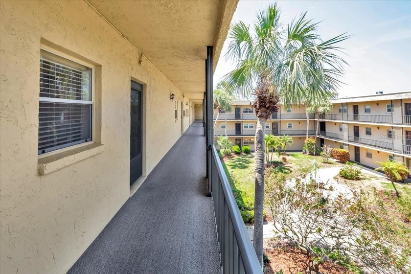 Step into this beautifully maintained 1-bedroom, 1.5-bath condo - photo 2