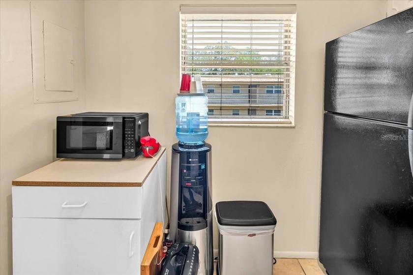 Step into this beautifully maintained 1-bedroom, 1.5-bath condo - photo 6