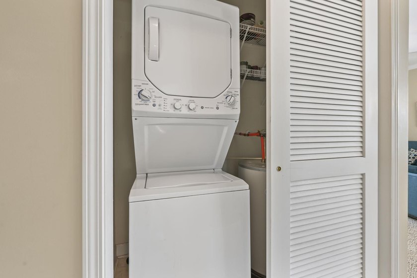 Move in ready 2BR/2BA fully furnished SECOND FLOOR END UNIT with - photo 18