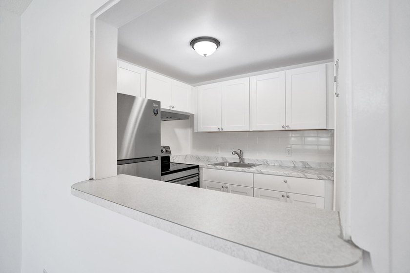 Charming Updated 1-BR/1-BA First-Floor Unit - Just 3.3 Miles to - photo 6