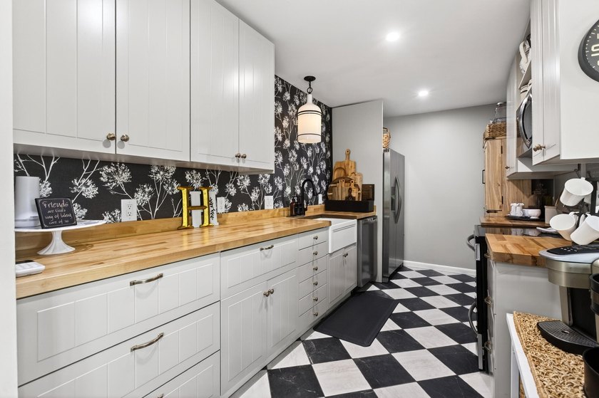 Welcome to this charming 4 bedroom 2 bath house in the heart of - photo 11