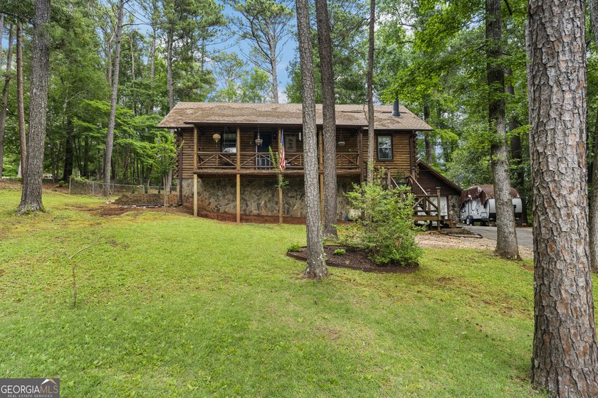 Rustic charm meets modern comfort in this beautiful log home - photo 25