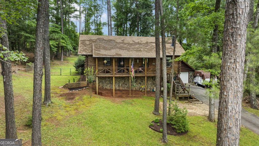 Rustic charm meets modern comfort in this beautiful log home - photo 36