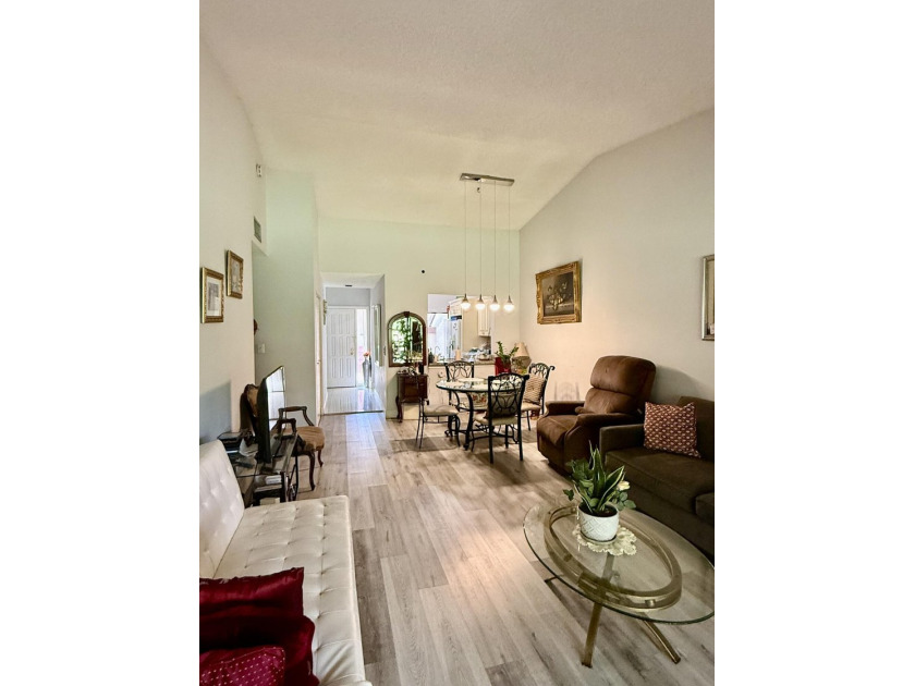 Welcome to this well-maintained 2-bedroom, 2-bath villa located - photo 5