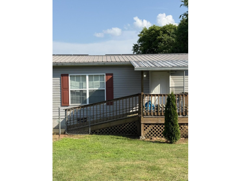 Charming 2BR/2BA home on .41 acres featuring owned solar panels - photo 8