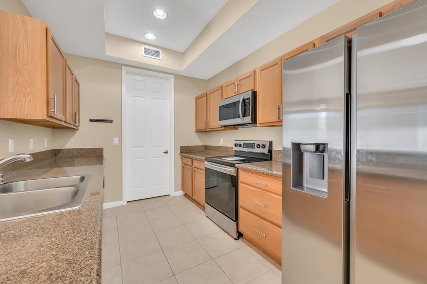 Take a look at this stunning 2 bed 2 bath condo with a 1 car - photo 5