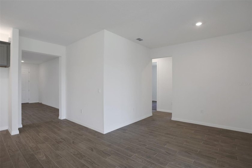 Virtually Staged. The Lucca floor plan offers 2,111 square feet - photo 22