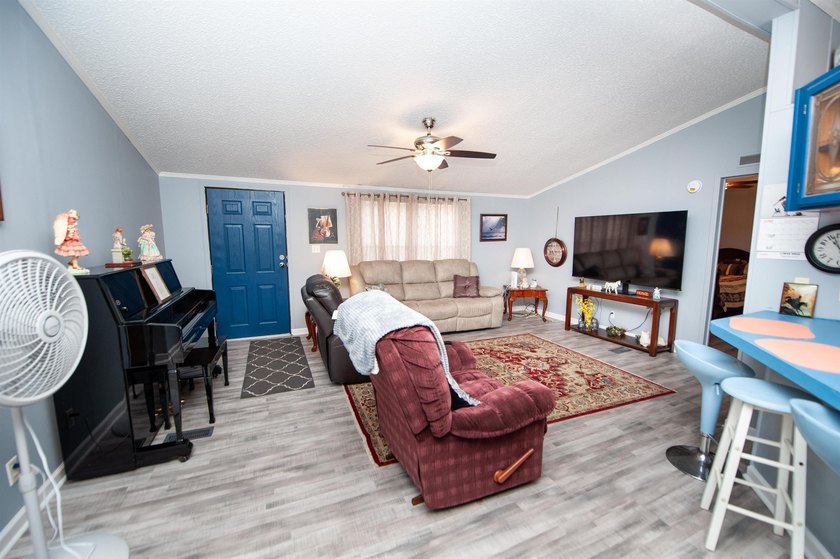 This 3 bedroom, 2 bath manufactured home is on a level .60 acre - photo 5