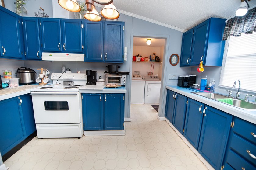 This 3 bedroom, 2 bath manufactured home is on a level .60 acre - photo 8