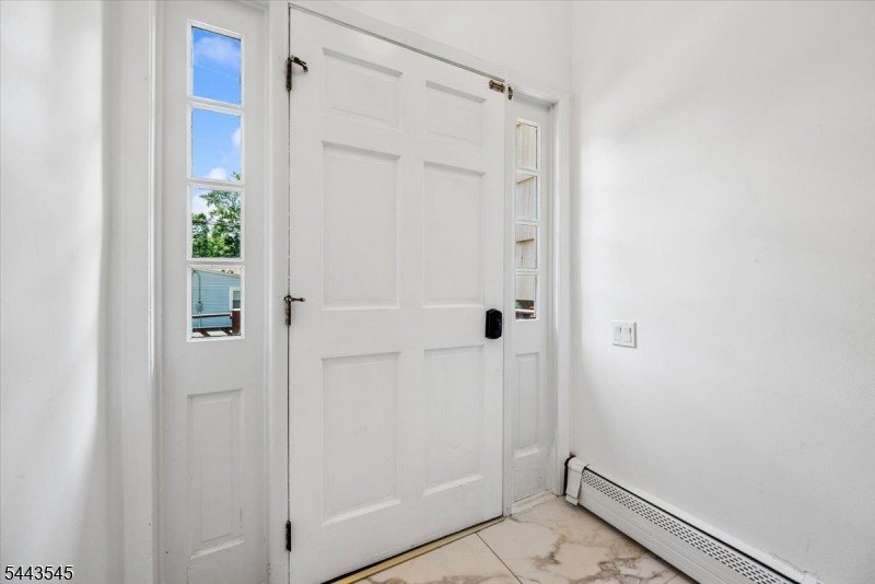 Welcome home to this beautifully maintained 3-bedroom bi-level - photo 6