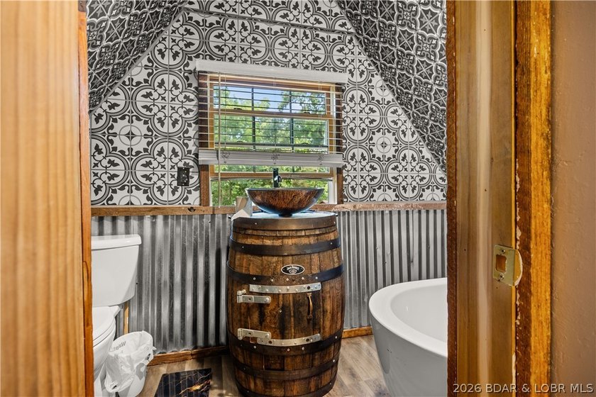 Escape to this adorable 2-bed, 2-bath rustic log cabin tucked - photo 15