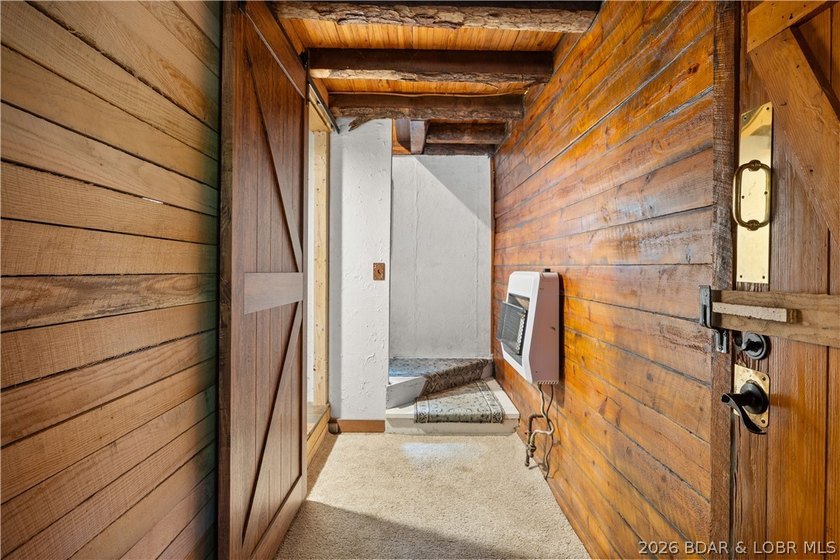 Escape to this adorable 2-bed, 2-bath rustic log cabin tucked - photo 22