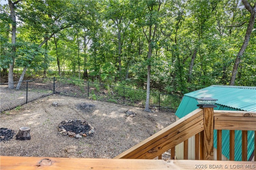 Escape to this adorable 2-bed, 2-bath rustic log cabin tucked - photo 25