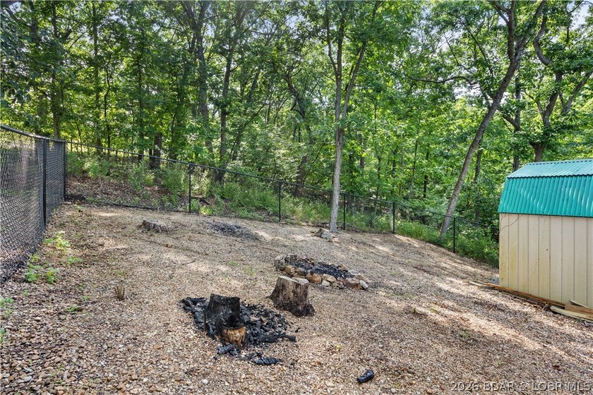 Escape to this adorable 2-bed, 2-bath rustic log cabin tucked - photo 26