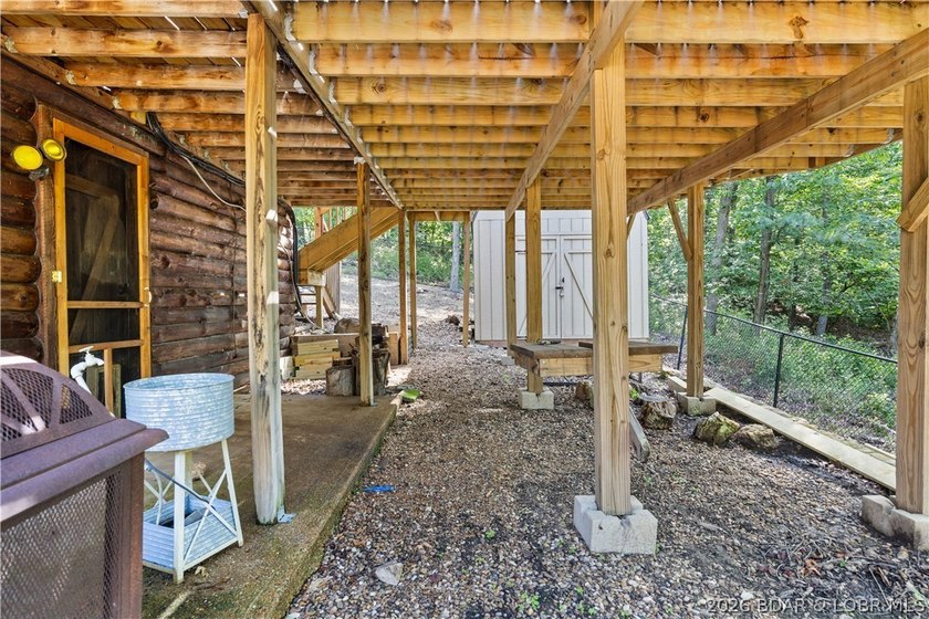 Escape to this adorable 2-bed, 2-bath rustic log cabin tucked - photo 29