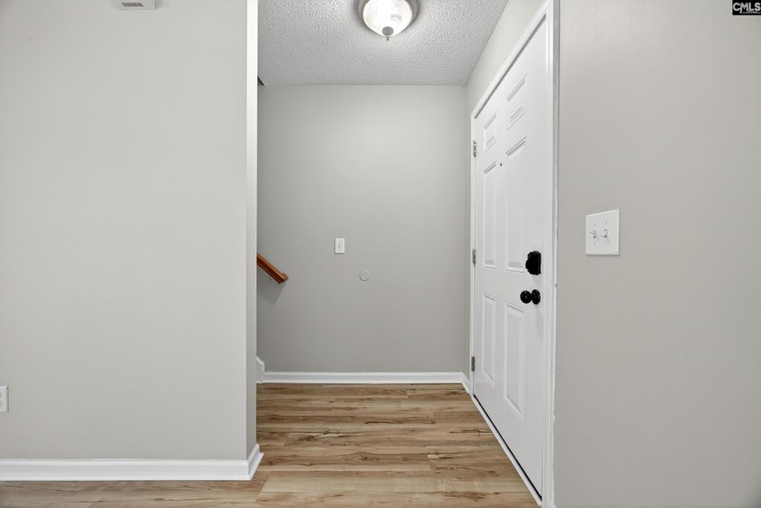 Welcome home to this beautifully updated 4-bedroom, 2.5-bath - photo 4