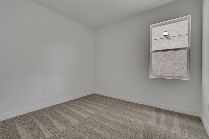 Virtually Staged. Welcome to the Lucca, a beautifully designed - photo 35