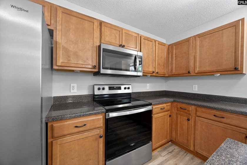 Welcome home to this beautifully updated 4-bedroom, 2.5-bath - photo 10