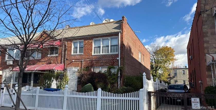 This two-story home features five bedrooms, two full baths, two - photo 2