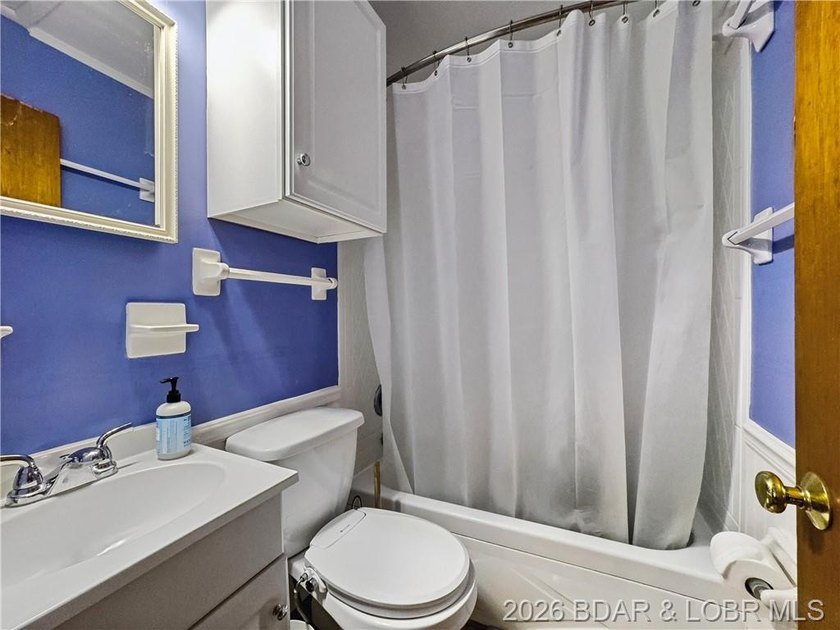 This lake home has it all for 1 price - Boat, 2 PWC's, Paddle - photo 25