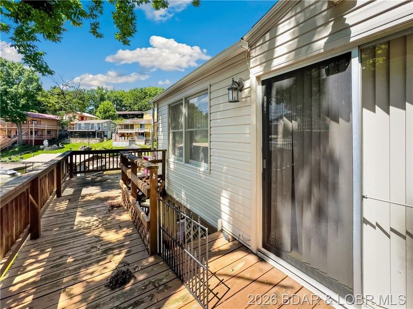 This lake home has it all for 1 price - Boat, 2 PWC's, Paddle - photo 35