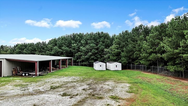 Great opportunity! 5.07 acres, approx 3+- acres fenced, balance - photo 22