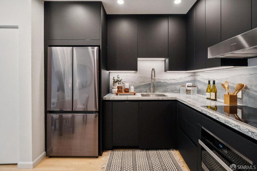 Location, Light and Excellence! This updated two-story condo - photo 3