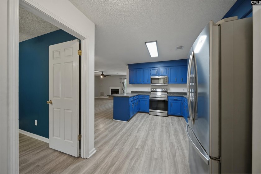Tucked away at the end of a quiet cul-de-sac, this townhome is - photo 8