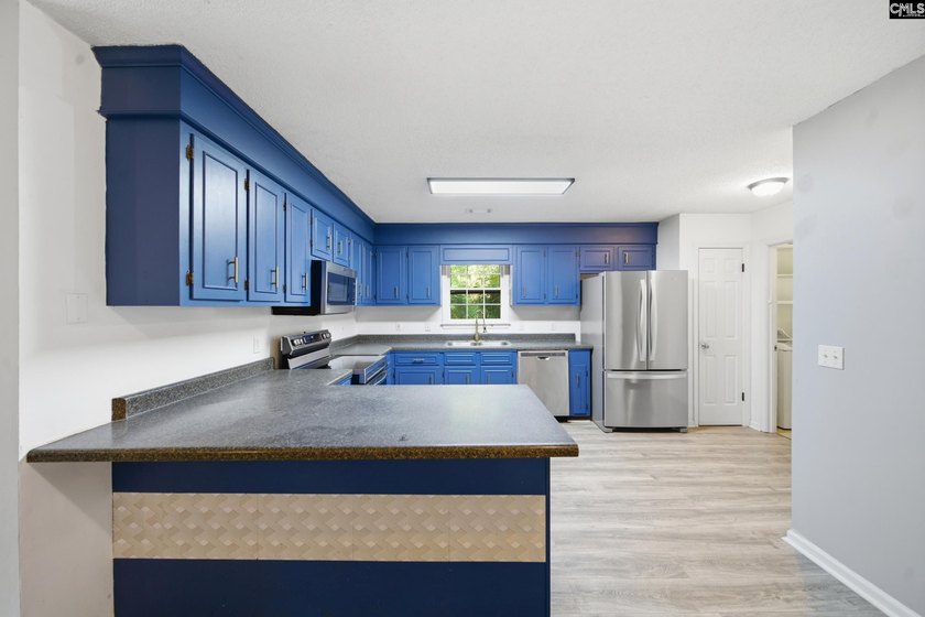 Tucked away at the end of a quiet cul-de-sac, this townhome is - photo 9