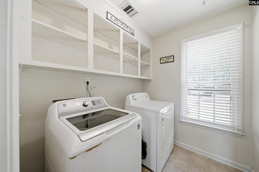 Tucked away at the end of a quiet cul-de-sac, this townhome is - photo 10