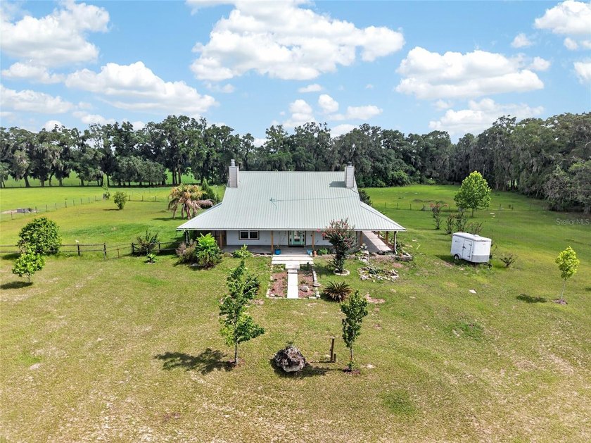 Five fenced acres. Nearly 5,000 square feet under roof. No HOA - photo 2