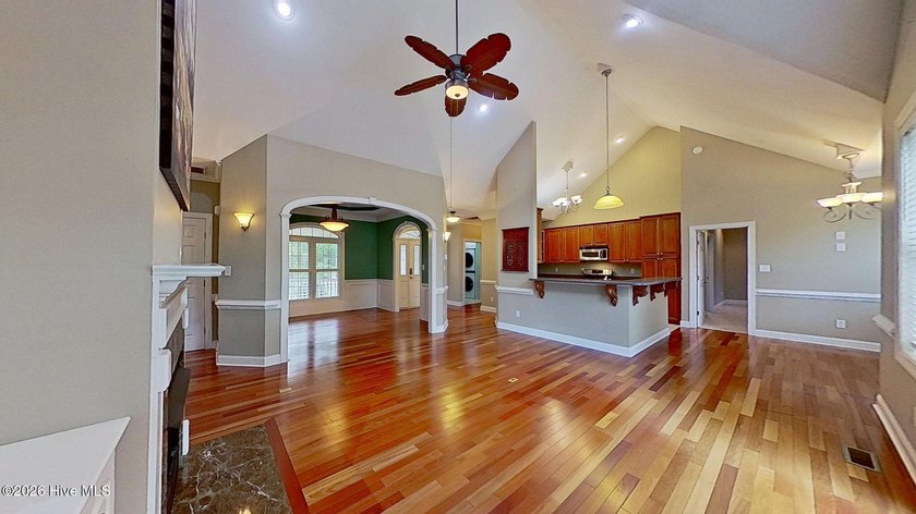 Discover refined coastal living in this beautifully maintained - photo 11